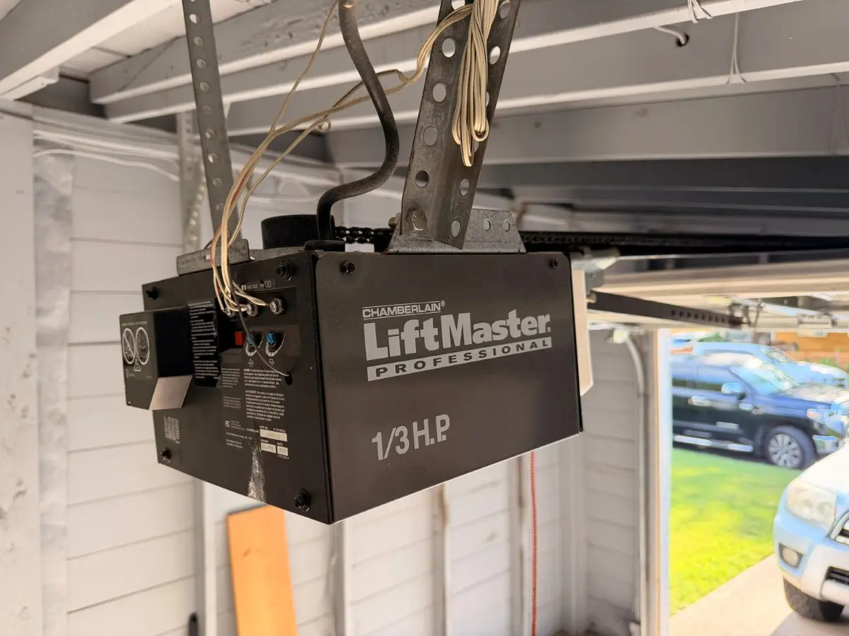 LiftMaster garage door opener mounted on a garage ceiling